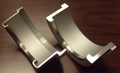 Powdered Metal to Metal Stamping Conversion of an ABS Assembly for the Automotive Industry
